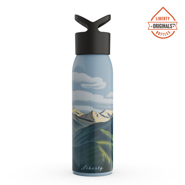 Mountains printed on a blue bottle