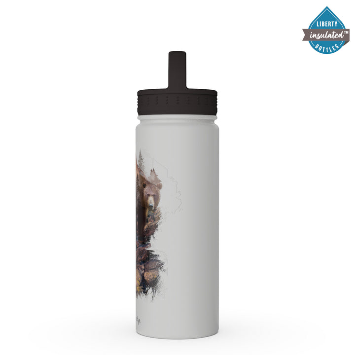 A grizzly in the mountains printed on a light grey bottle