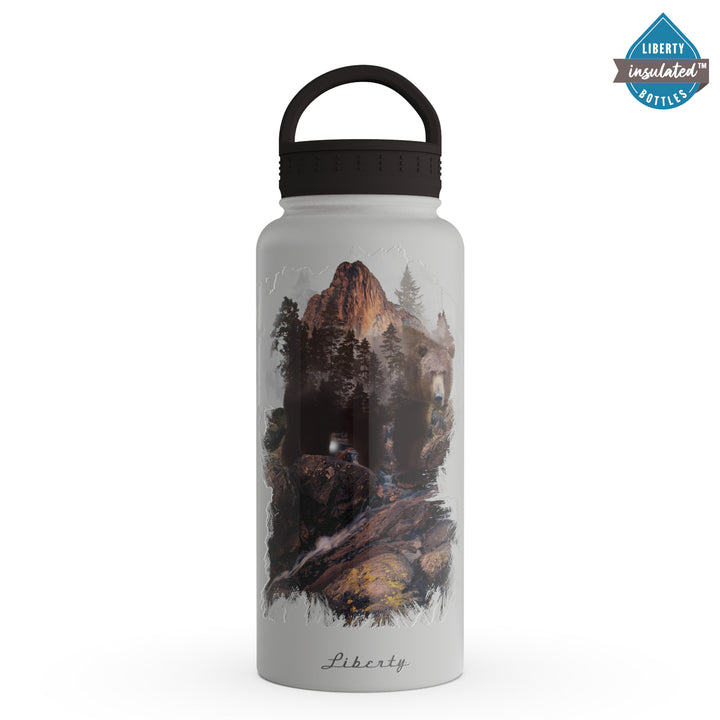 A grizzly in the mountains printed on a light grey bottle