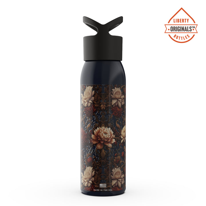 A vintage floral pattern on a navy blue bottle